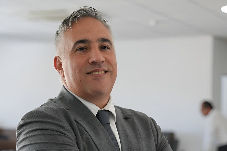 Ryan Borg Returns to AIMS Amid Past Criticisms